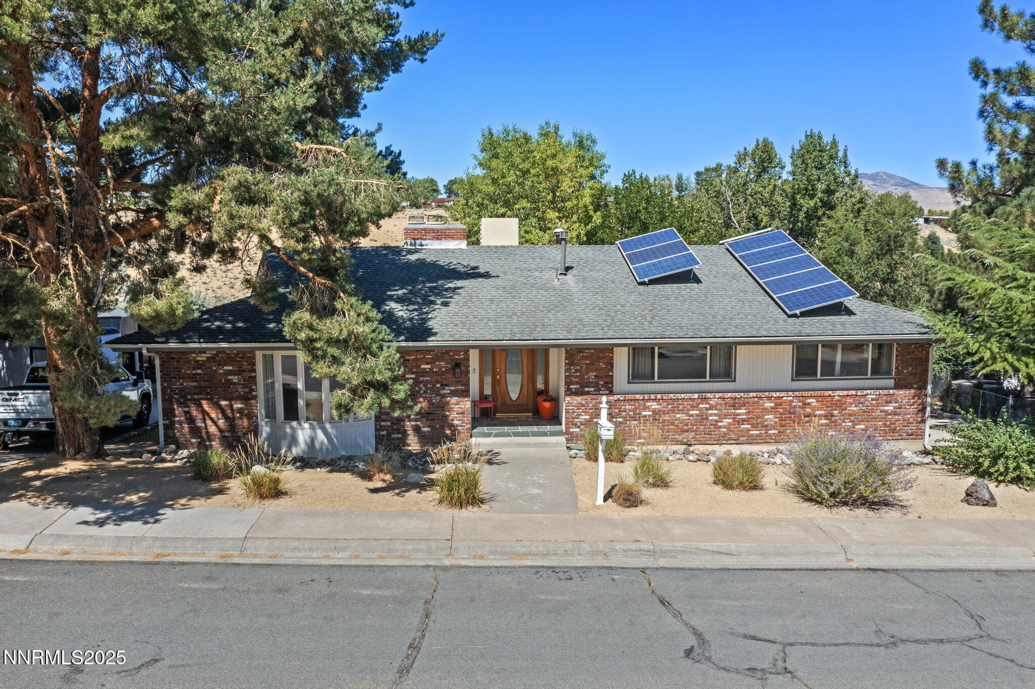 2275 Solari Drive Reno, NV 89509 - Photo 4 of 52 front view of house with a street