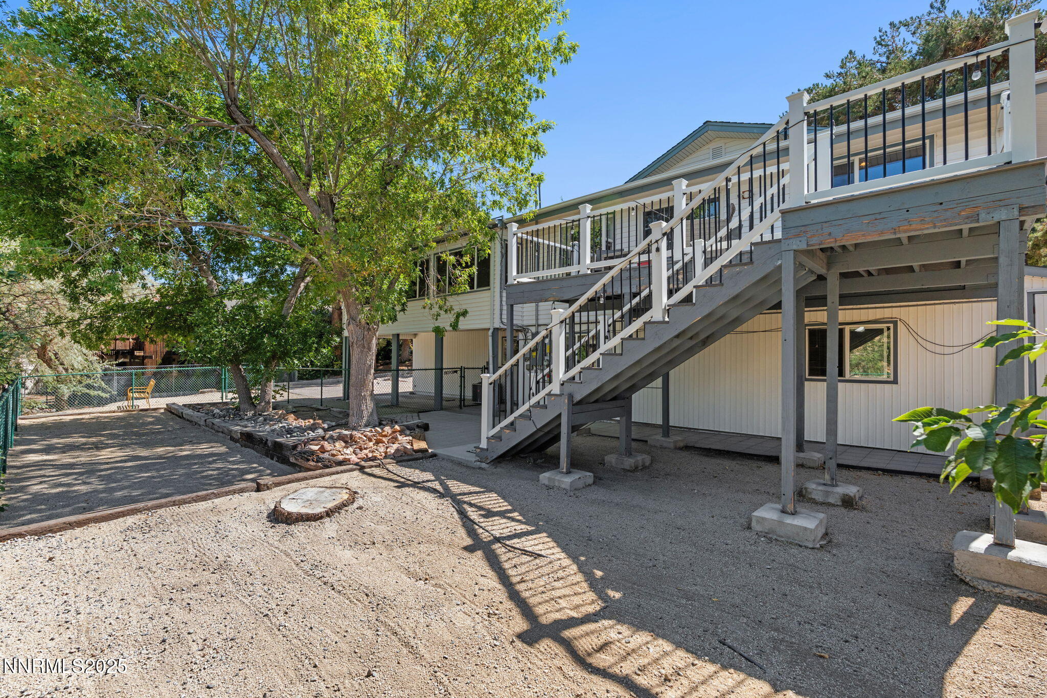 2275 Solari Drive Reno, NV 89509 - Photo 49 of 52 a house with trees in front of it