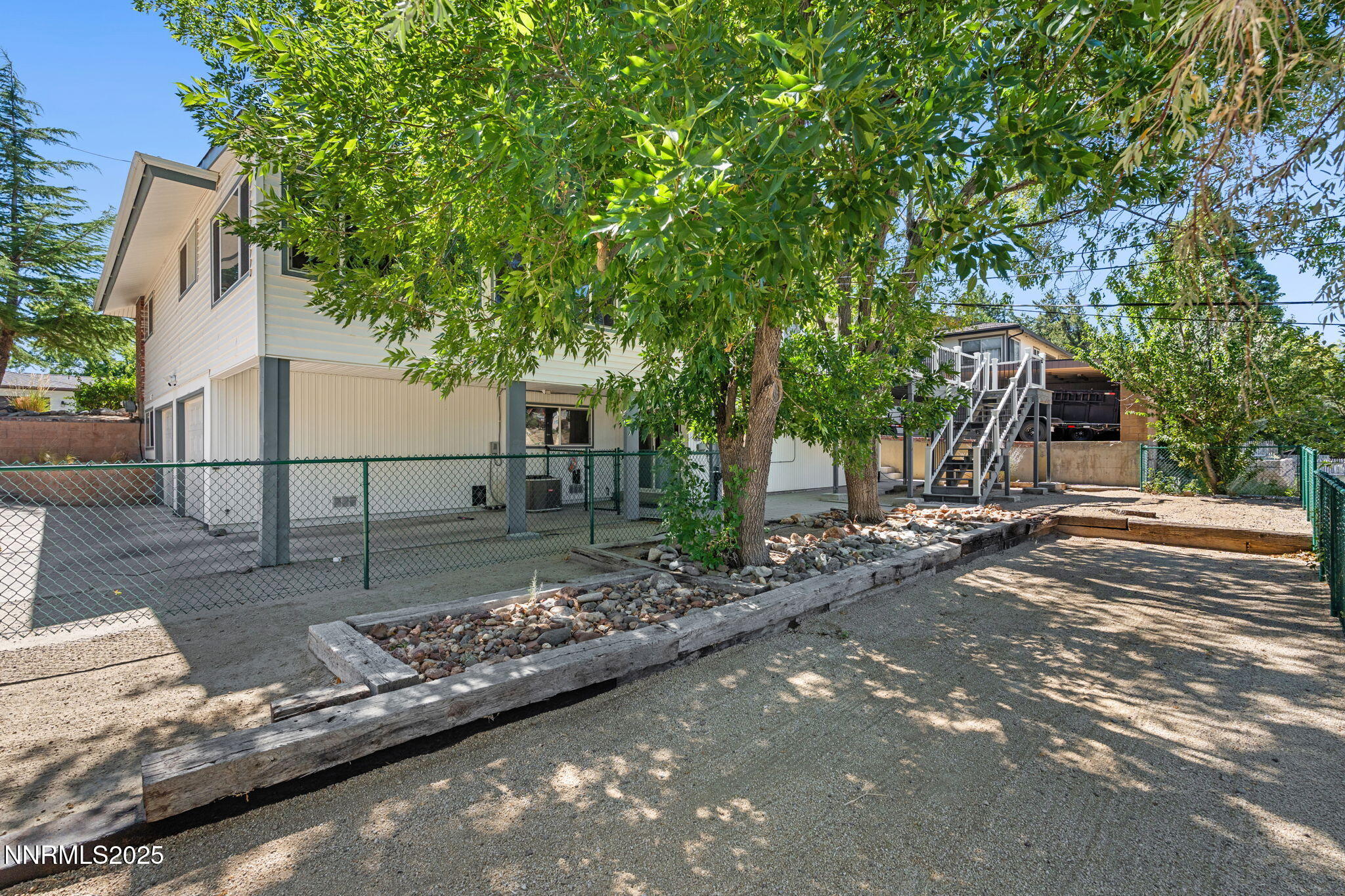 2275 Solari Drive Reno, NV 89509 - Photo 50 of 52 a view of a street with a tree