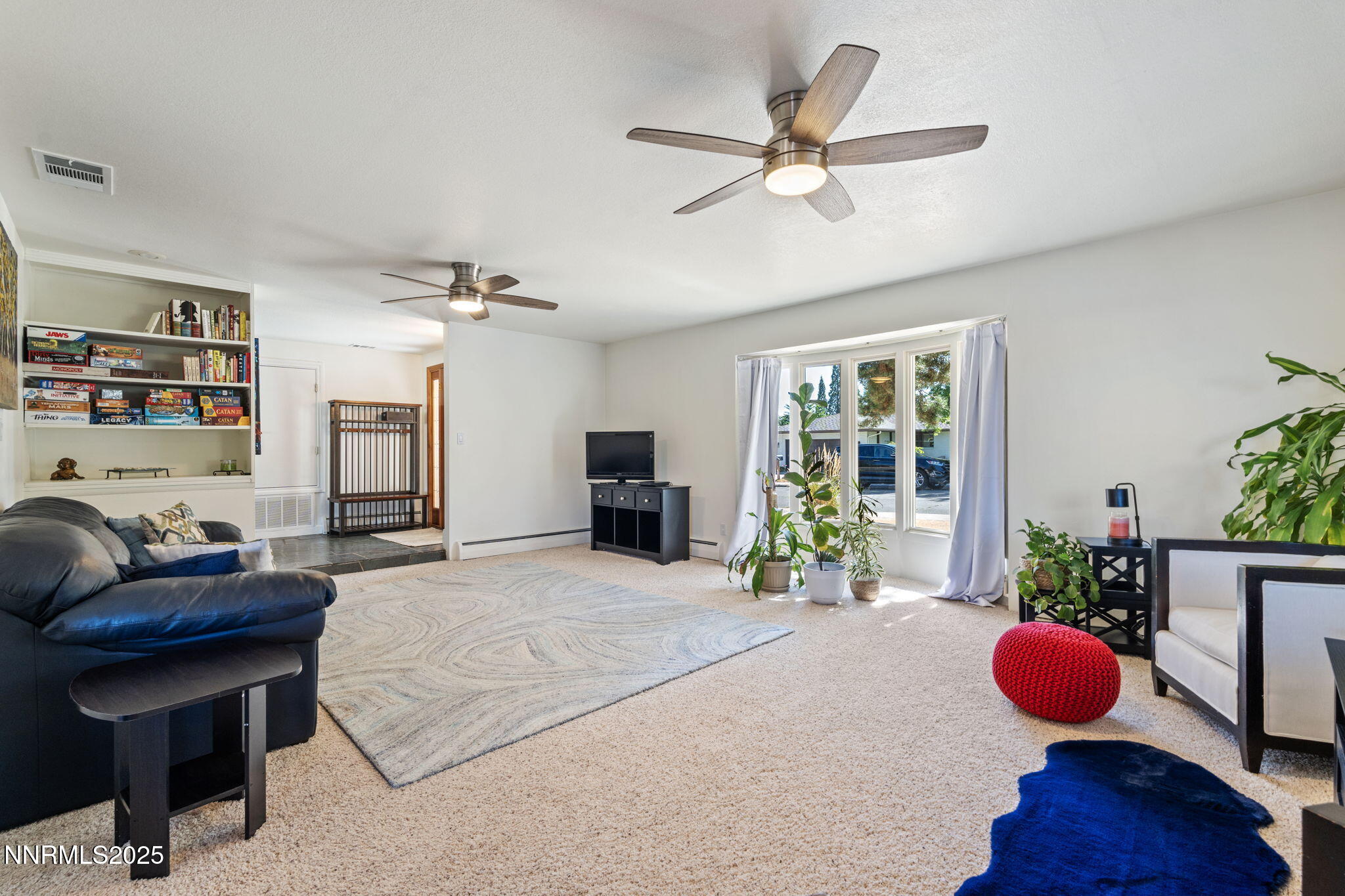 2275 Solari Drive Reno, NV 89509 - Photo 8 of 52 a living room with furniture and a potted plant