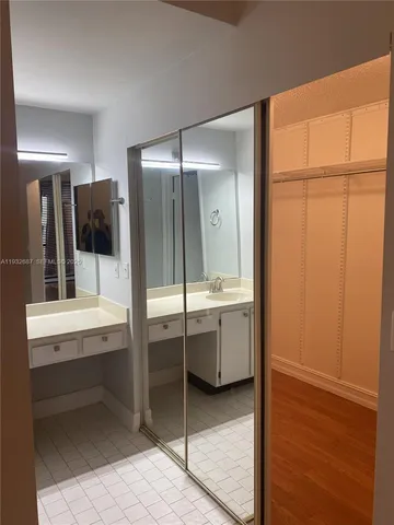 a bathroom with a tub and a sink