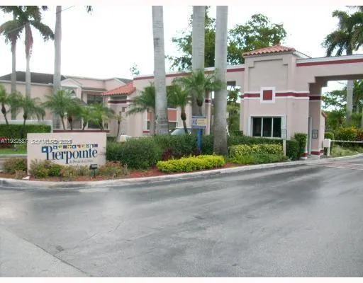 a view of a street with a large building