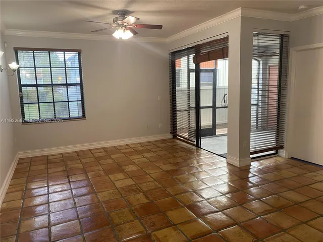 a view of an empty room and window