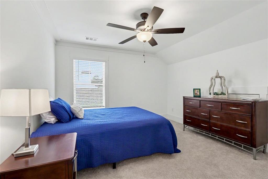 943 Clubside Drive Monroe, GA 30655 - Photo 52 of 93 a bedroom with a bed and window