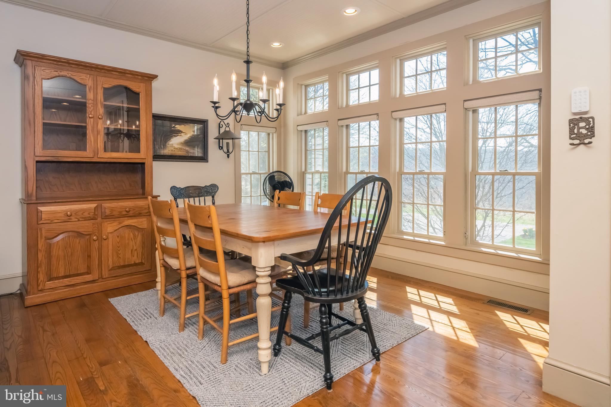 726 Sunset Ridge Drive McHenry, MD 21541 - Photo 13 of 50 a view of a dining room with furniture window and wooden floor