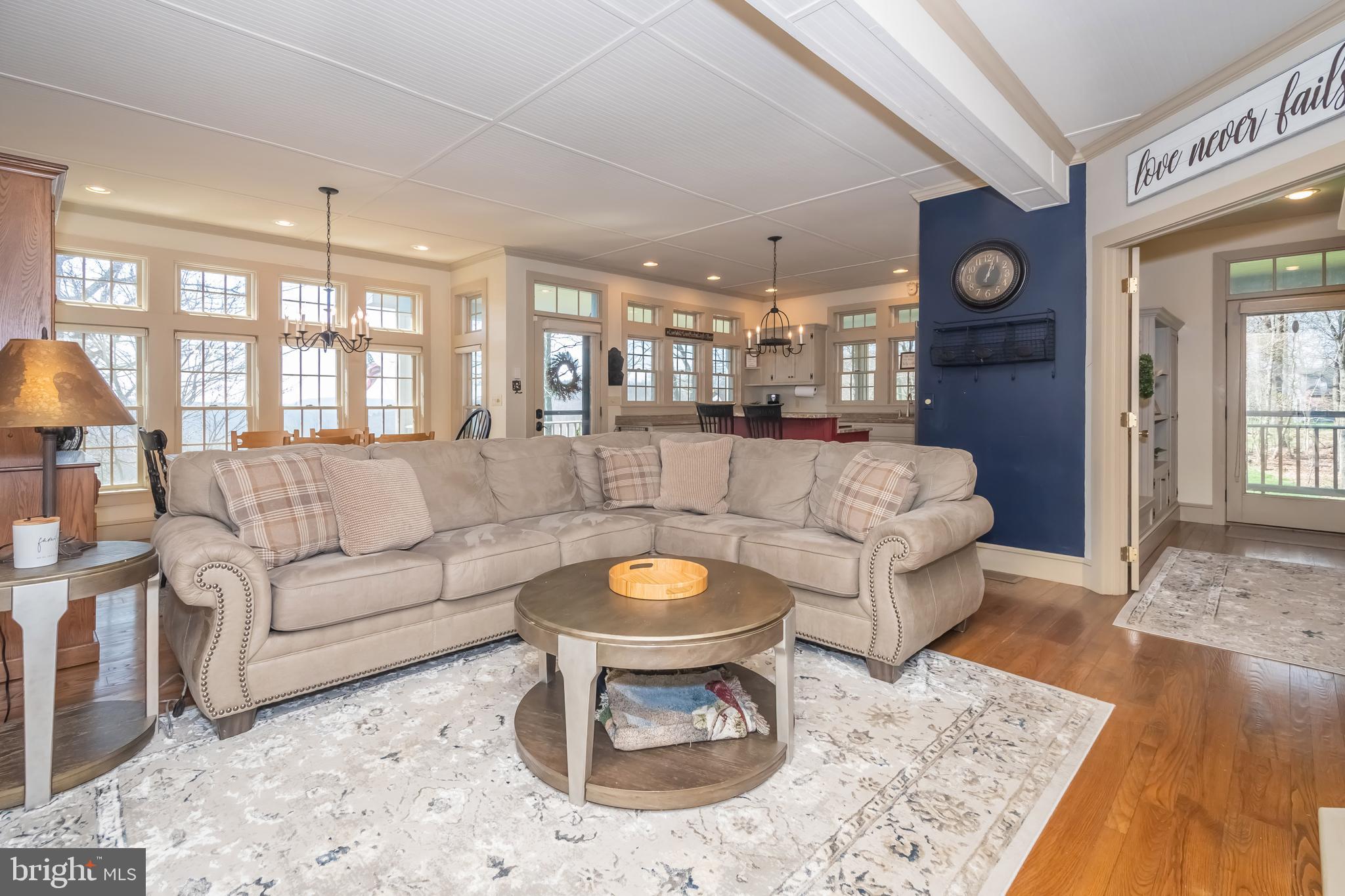 726 Sunset Ridge Drive McHenry, MD 21541 - Photo 15 of 50 a living room with furniture and wooden floor