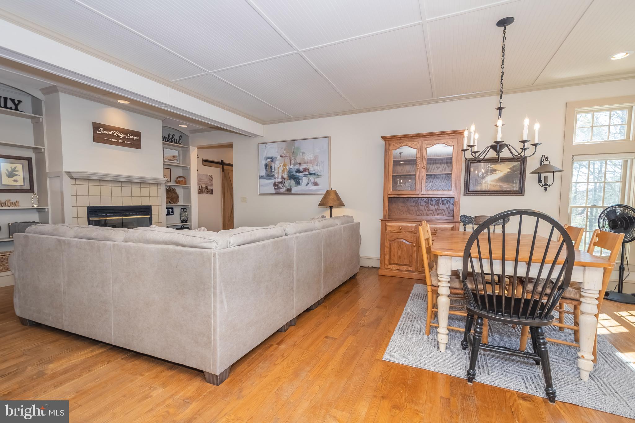 726 Sunset Ridge Drive McHenry, MD 21541 - Photo 19 of 50 a living room with furniture and a wooden floor