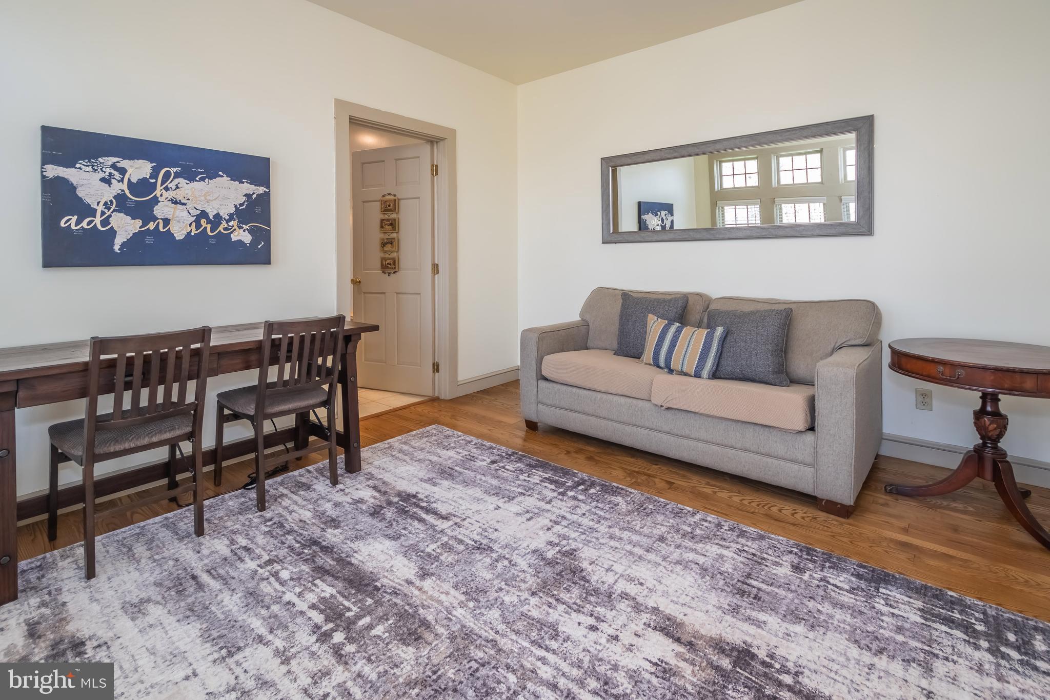 726 Sunset Ridge Drive McHenry, MD 21541 - Photo 24 of 50 a living room with furniture a rug and a window