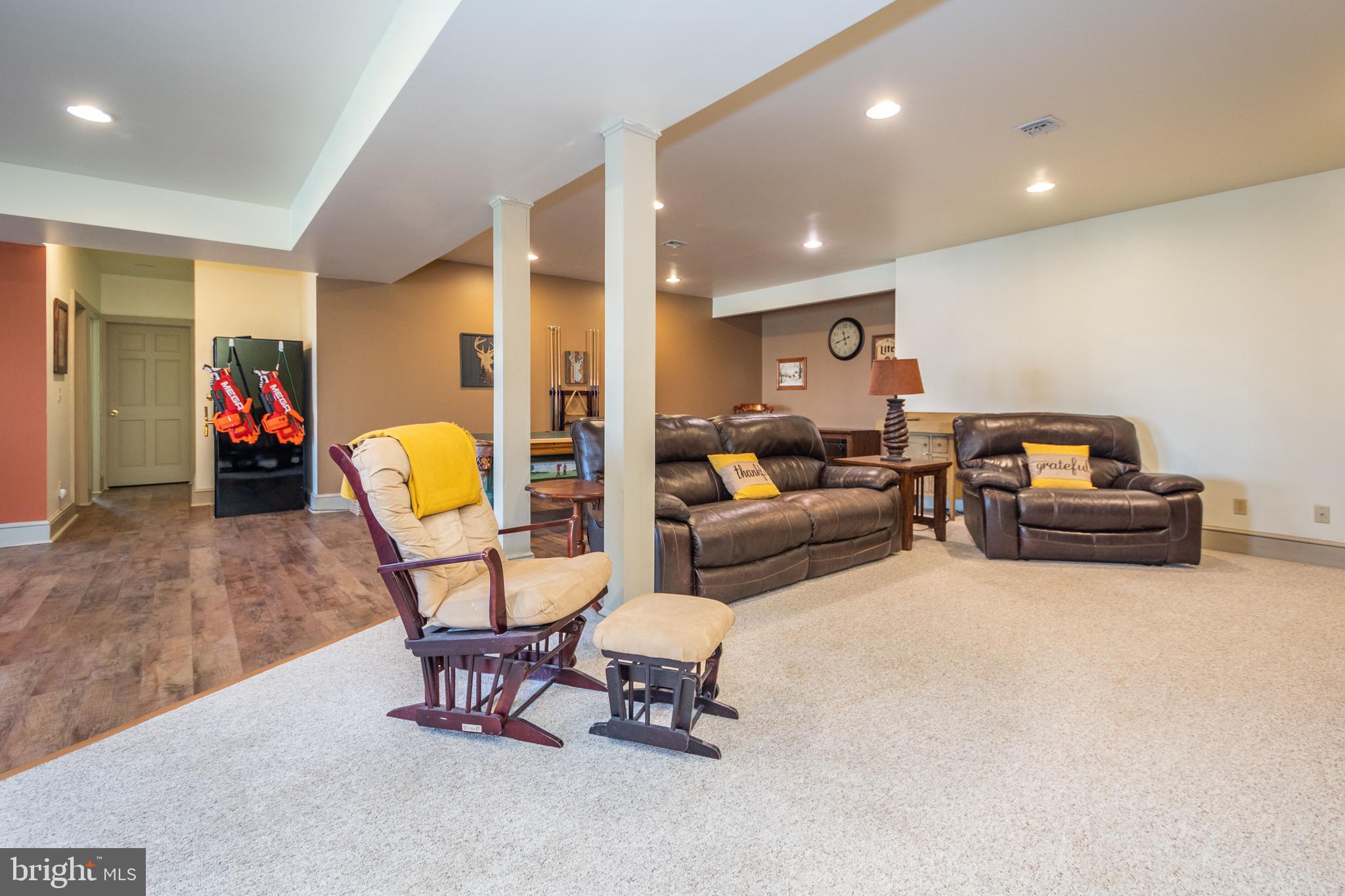 726 Sunset Ridge Drive McHenry, MD 21541 - Photo 28 of 50 a living room with furniture and a wooden floor