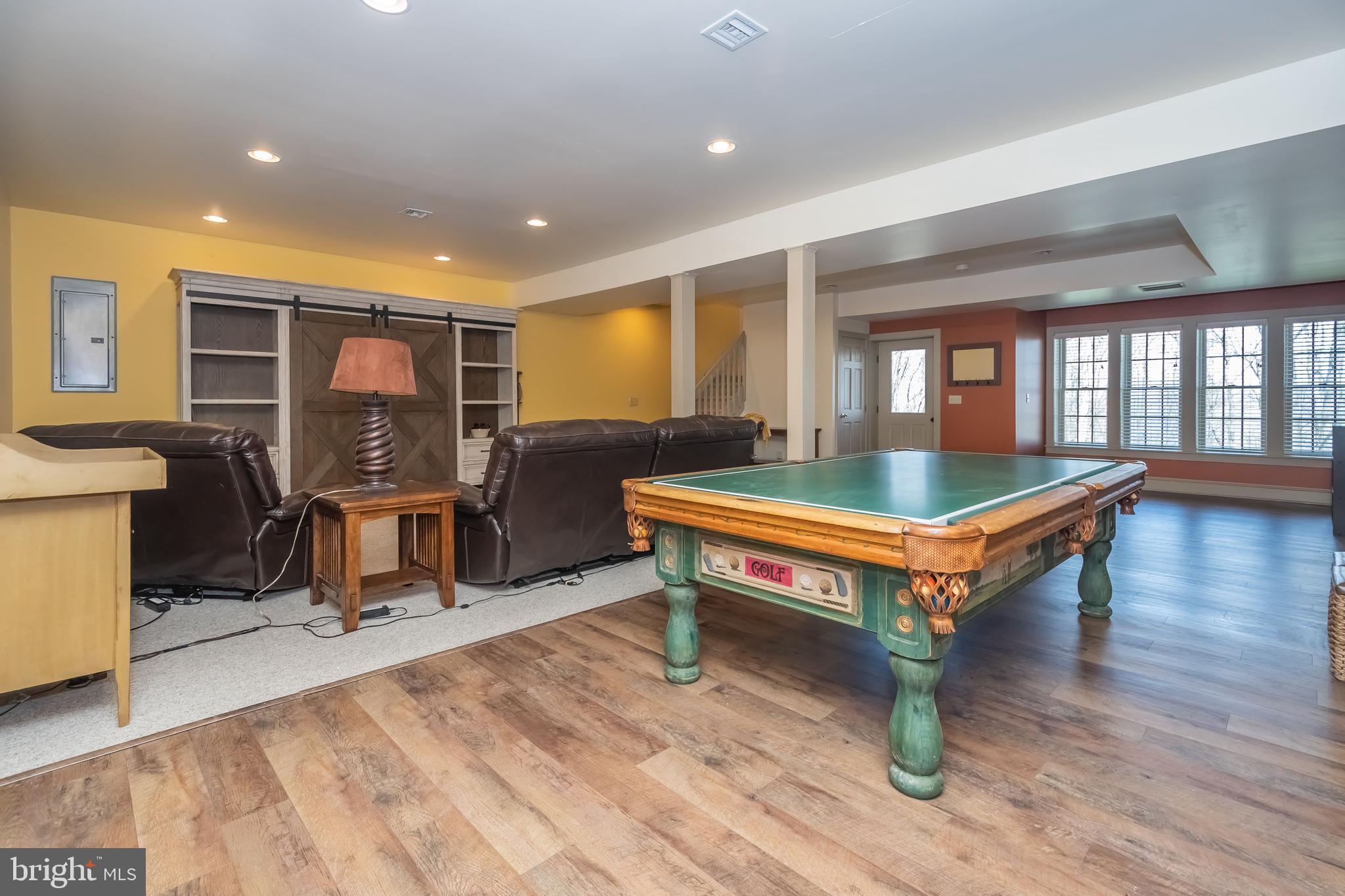 726 Sunset Ridge Drive McHenry, MD 21541 - Photo 32 of 50 a room with furniture pool table wooden floor and windows
