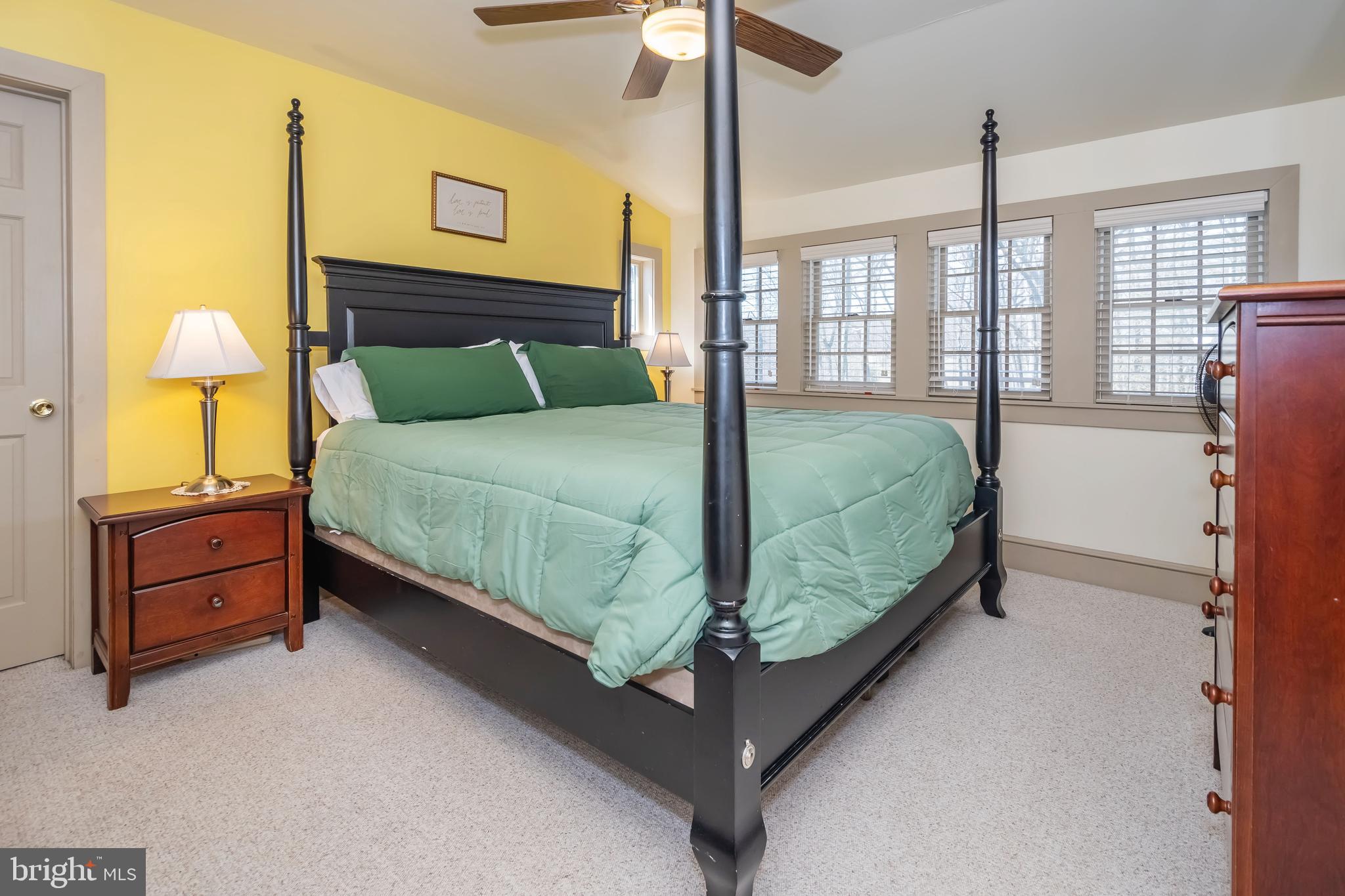 726 Sunset Ridge Drive McHenry, MD 21541 - Photo 34 of 50 a bed sitting in a bedroom next to a window