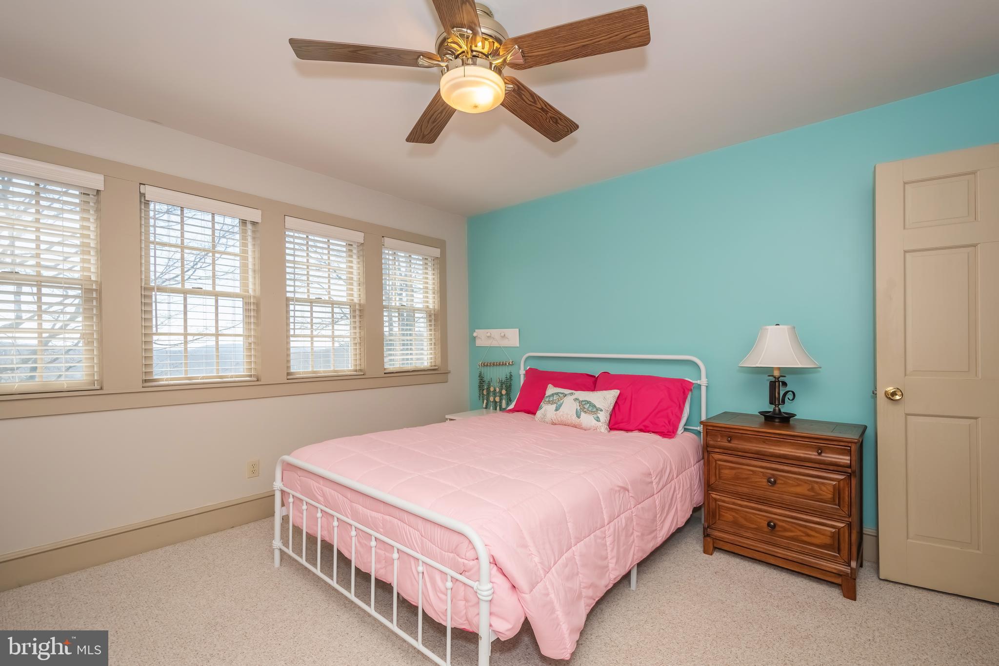 726 Sunset Ridge Drive McHenry, MD 21541 - Photo 39 of 50 a bedroom with a bed and a chandelier
