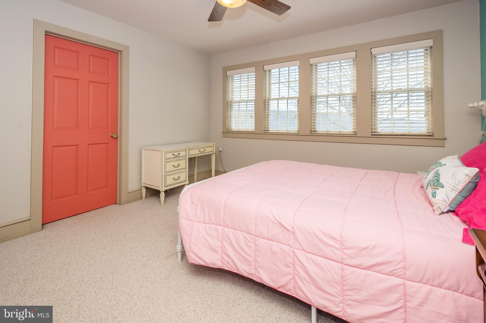 726 Sunset Ridge Drive McHenry, MD 21541 - Photo 41 of 50 a bedroom with a bed and a chandelier