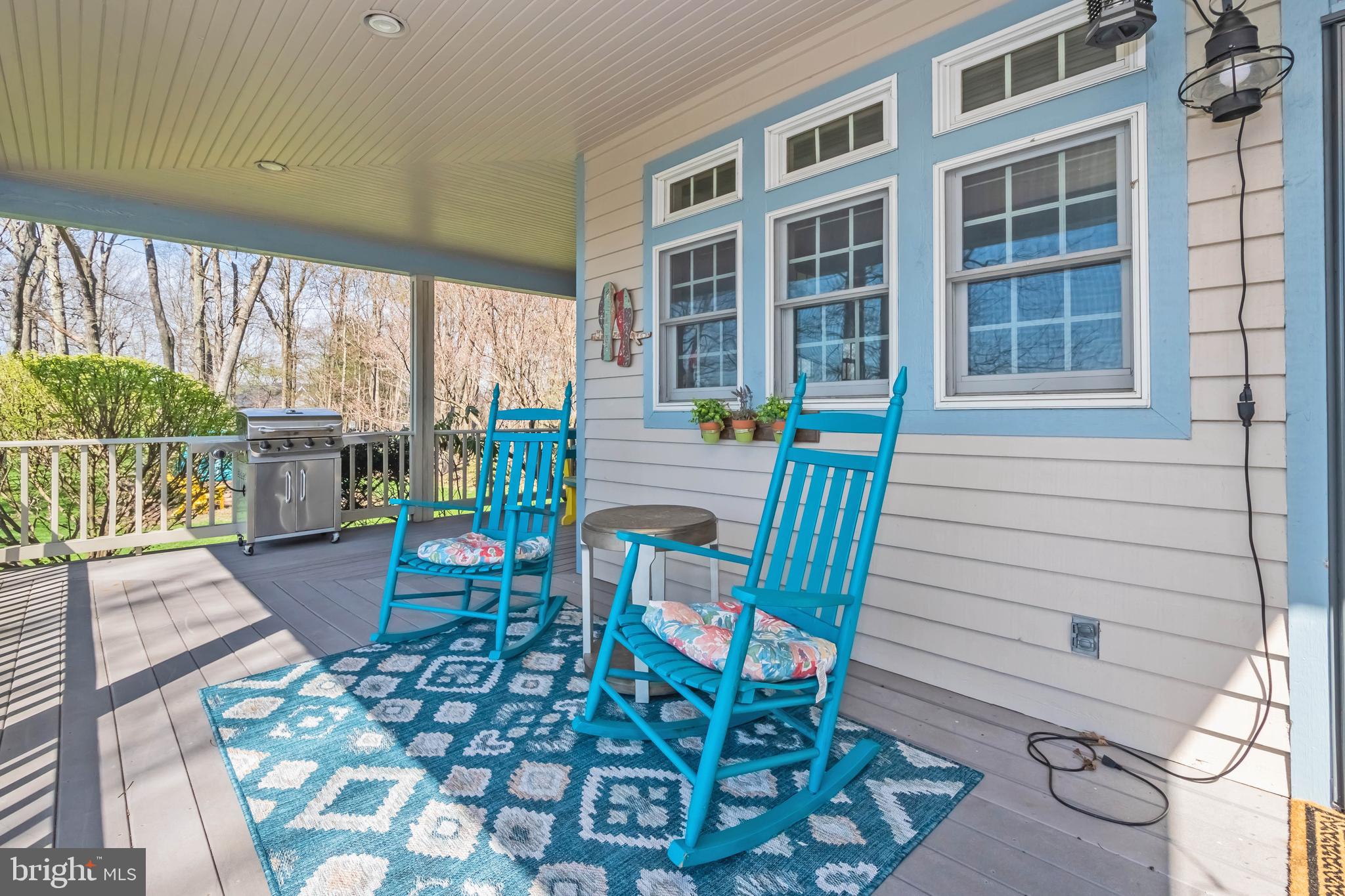 726 Sunset Ridge Drive McHenry, MD 21541 - Photo 47 of 50 a view of a patio with table and chairs and wooden floor
