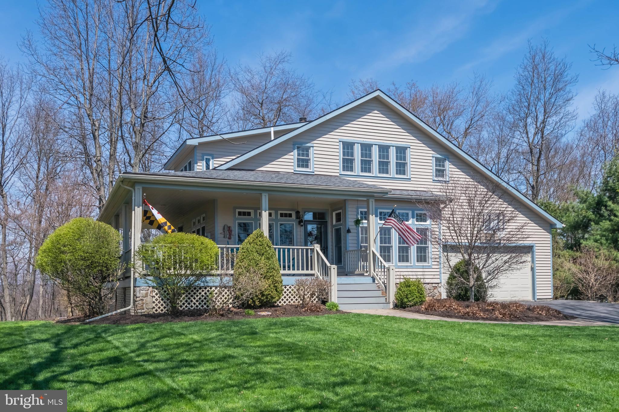 726 Sunset Ridge Drive McHenry, MD 21541 - Photo 6 of 50 a front view of a house with a yard and garage