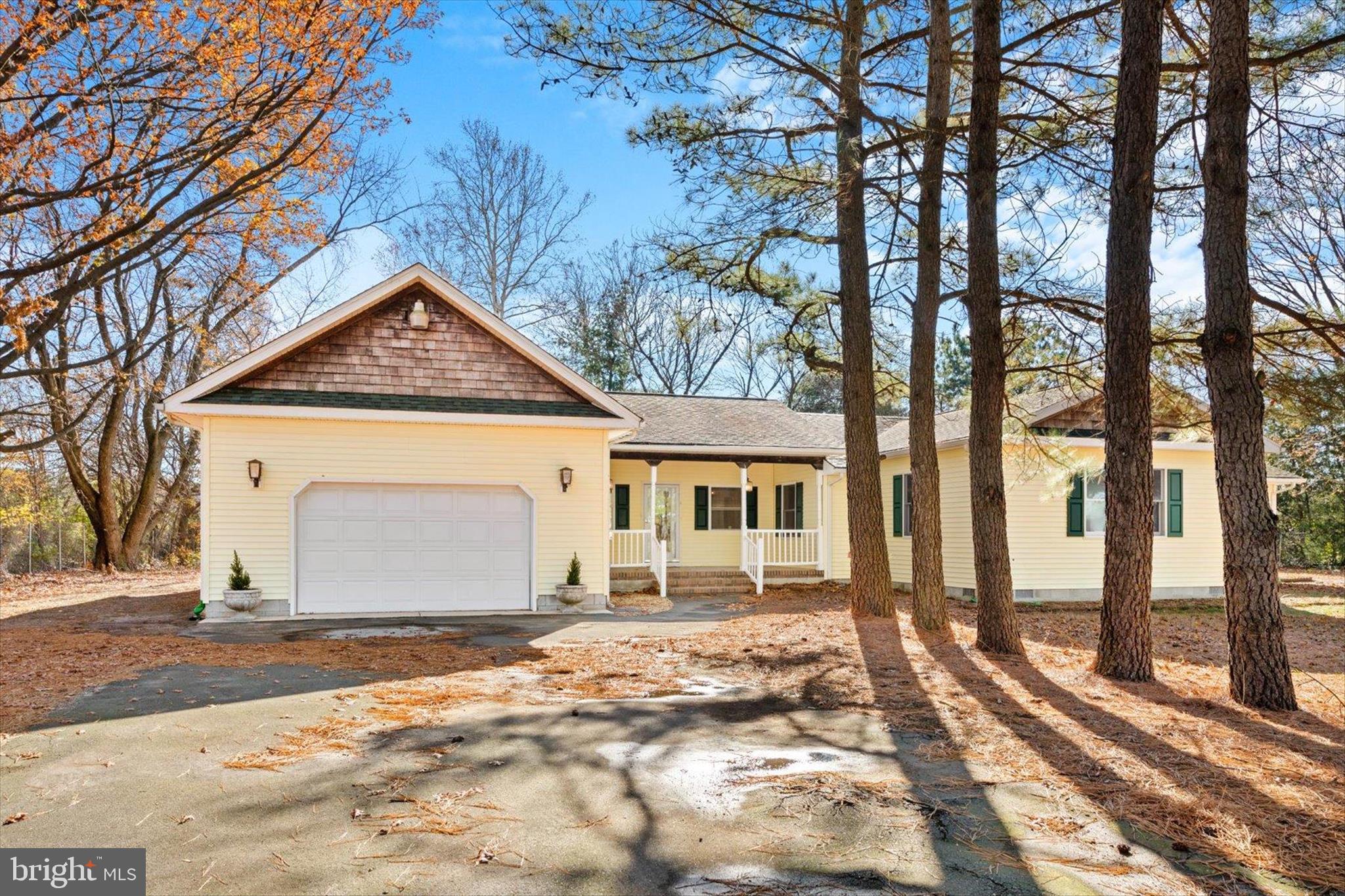 12468 Taylor Mill Road Laurel, DE 19956 - Photo 3 of 37 a front view of a house with a yard