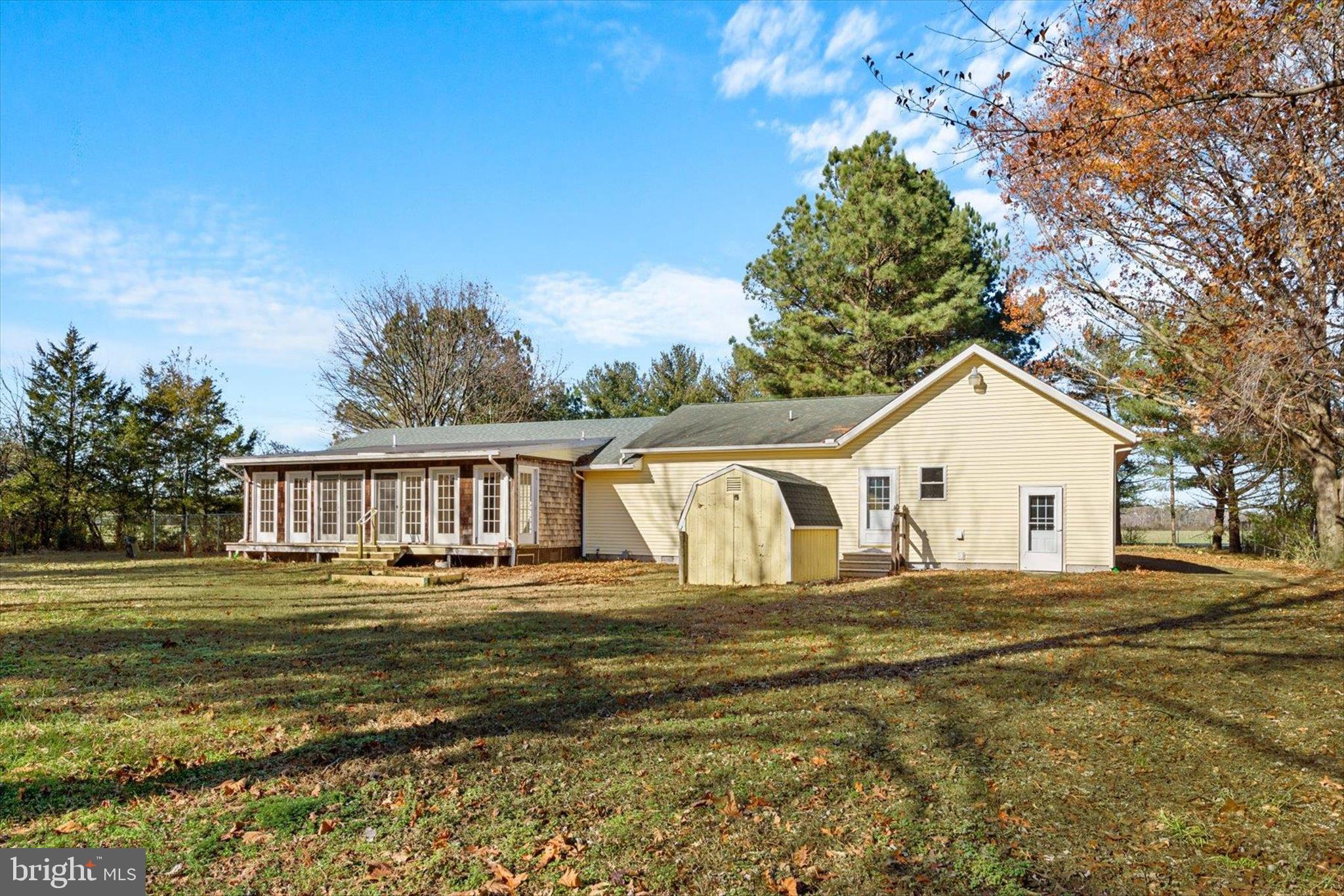12468 Taylor Mill Road Laurel, DE 19956 - Photo 35 of 37 a front view of a house with a garden