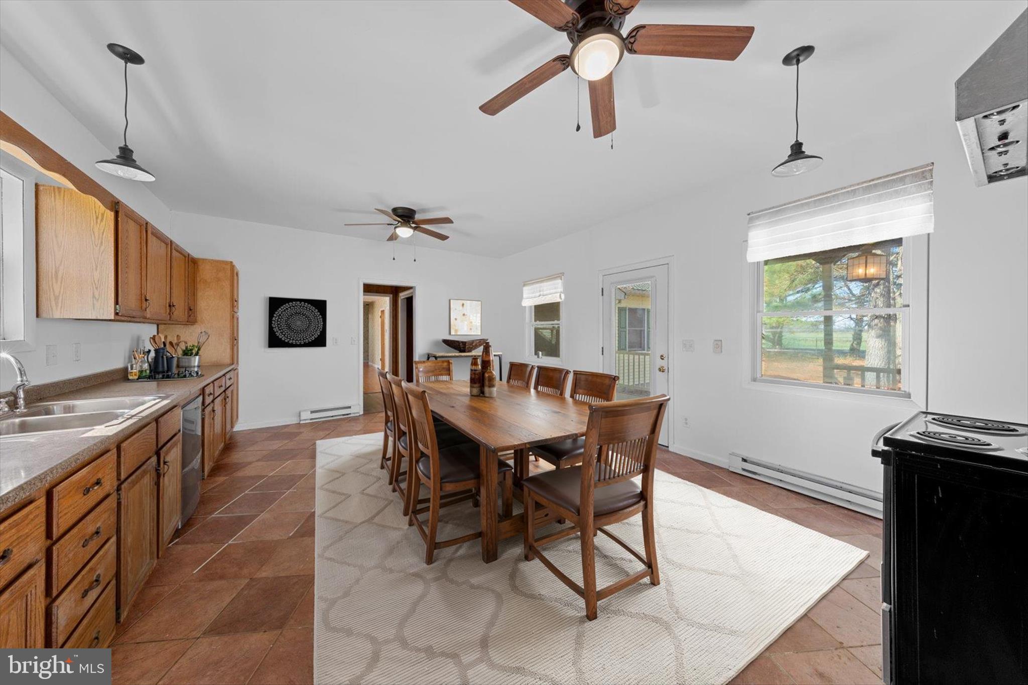 12468 Taylor Mill Road Laurel, DE 19956 - Photo 6 of 37 a view of a dining room with furniture and a window
