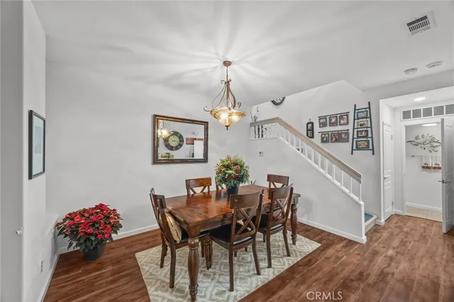 a kitchen with lots of counter top space sink and wooden cabinets
