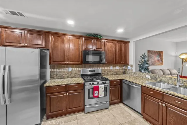 a view of a kitchen and dining area