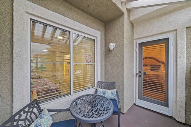 a en suite bathroom with a double vanity sink a mirror and a shower