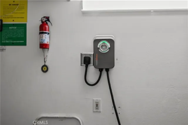 a view of a swimming pool with outdoor seating