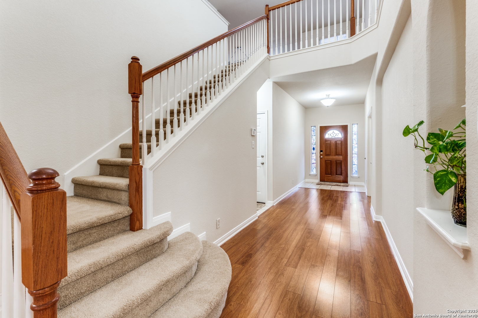 1935 Walter Raleigh Windcrest, TX 78239 - Photo 4 of 27 a view of entryway and hall with wooden floor