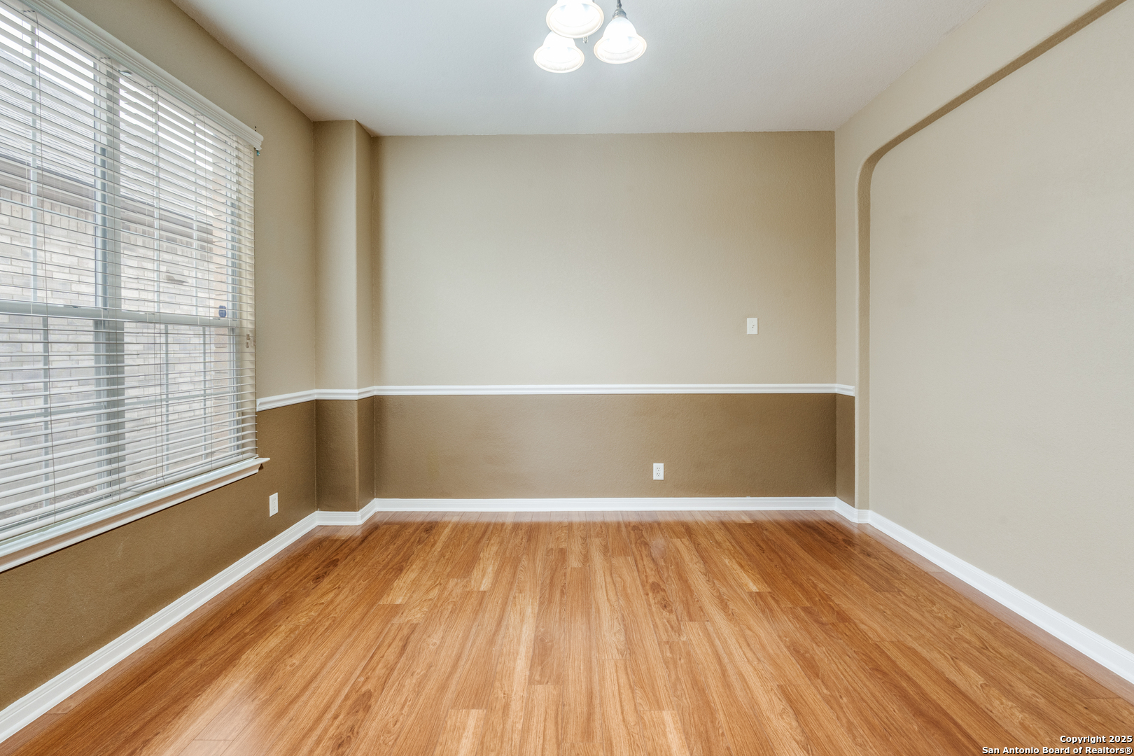 1935 Walter Raleigh Windcrest, TX 78239 - Photo 9 of 27 a view of wooden floor and brick walls