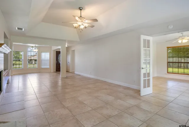 a view of an entryway with a chandelier