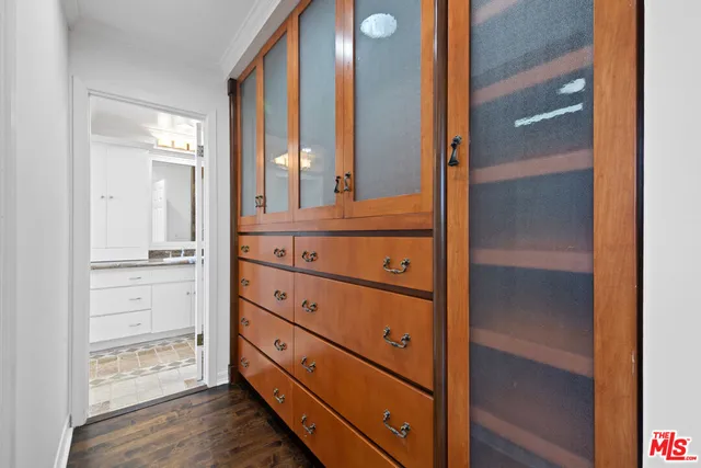 a view of a dresser with mirror