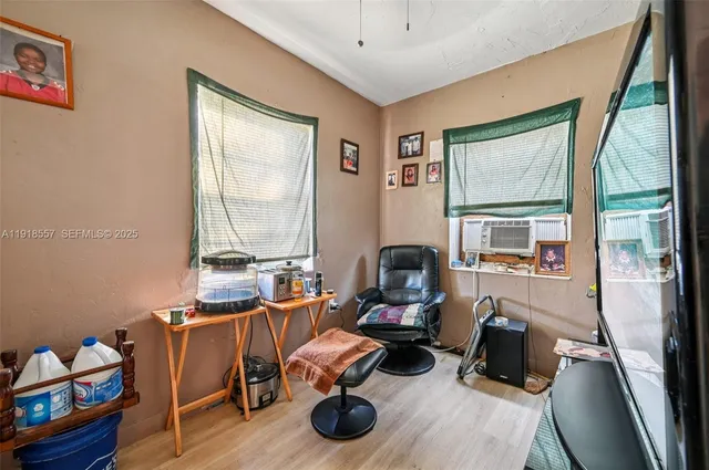 a room with furniture and a window