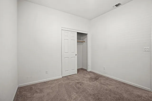 an empty room with closet
