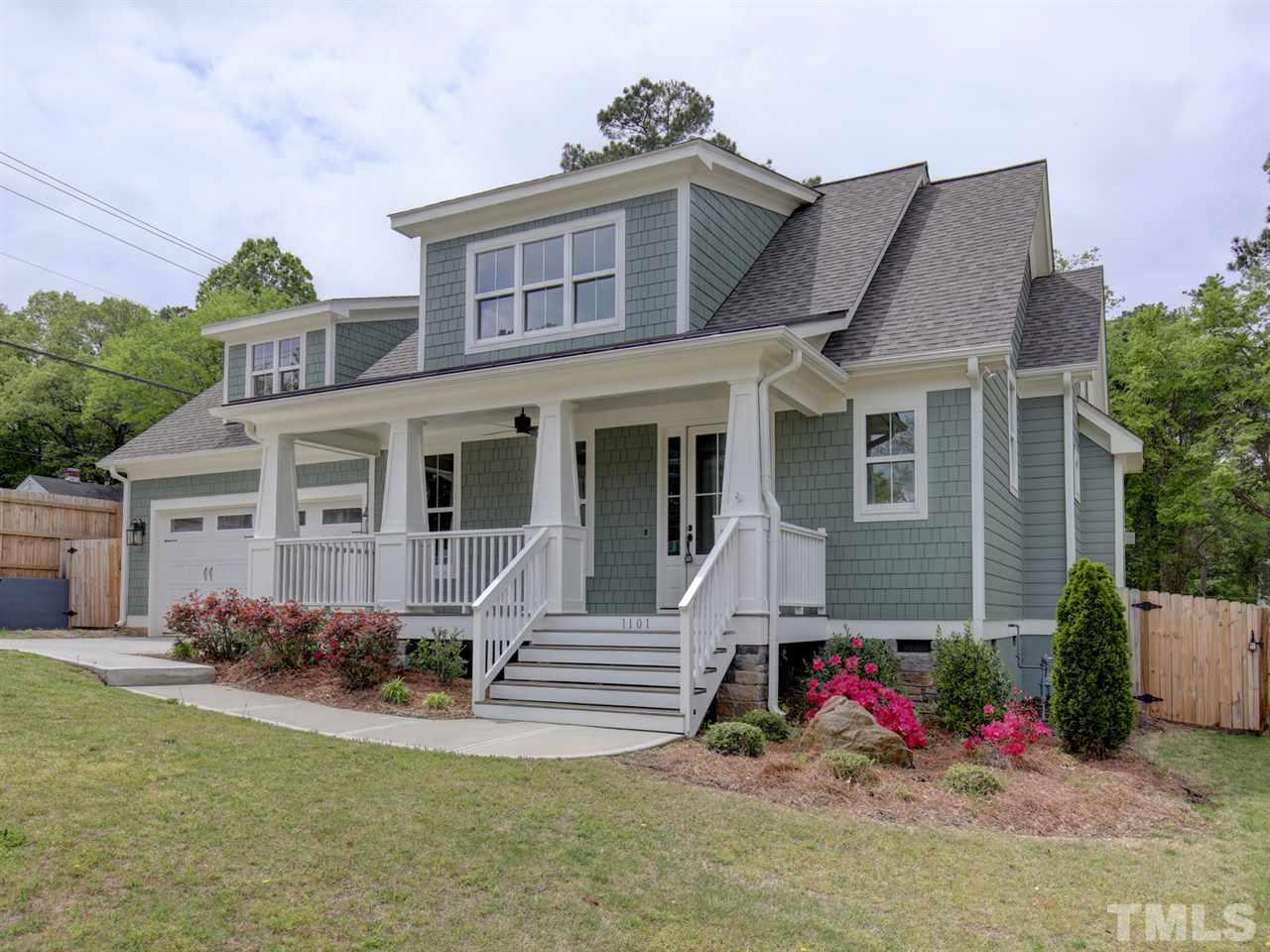 1101 North State Street Raleigh, NC 27604 - Photo 1 of 25 front view of a house with a yard