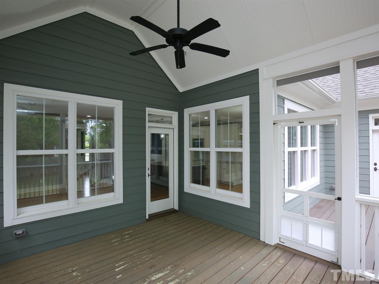 1101 North State Street Raleigh, NC 27604 - Photo 11 of 25 a view of empty room with wooden floor and fan