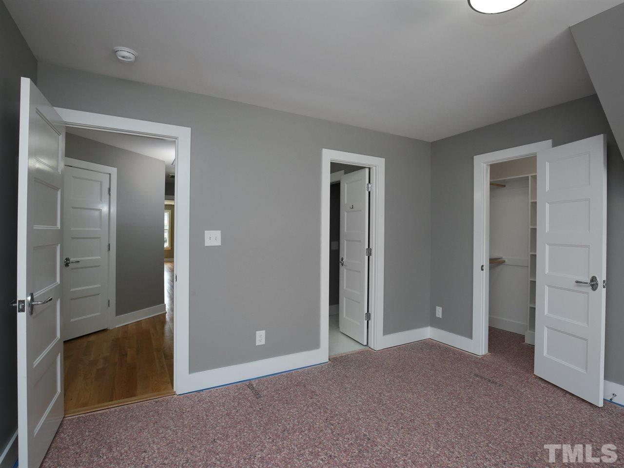 1101 North State Street Raleigh, NC 27604 - Photo 22 of 25 wooden floor and closet in a room