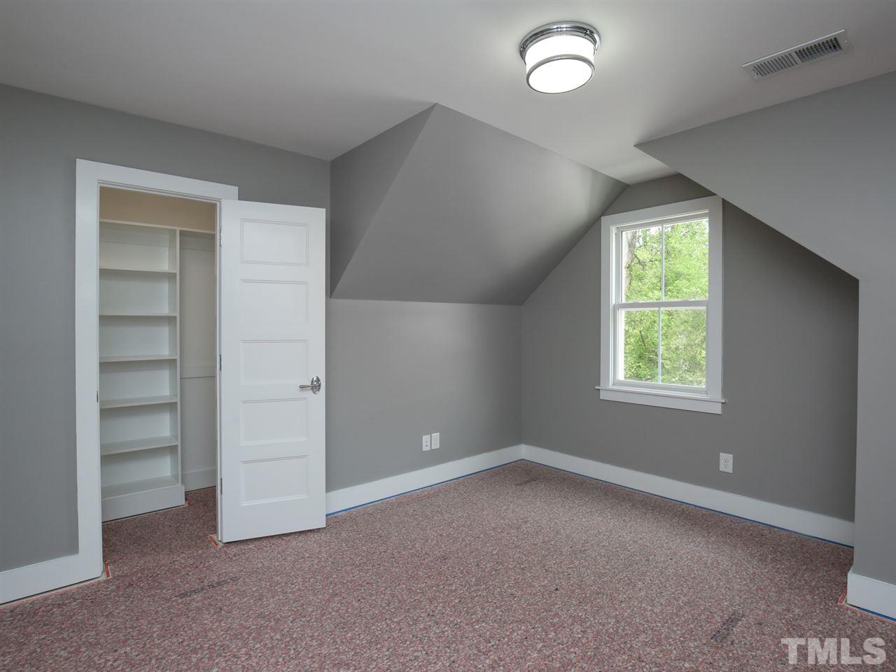 1101 North State Street Raleigh, NC 27604 - Photo 23 of 25 a view of room with window and ceiling fan