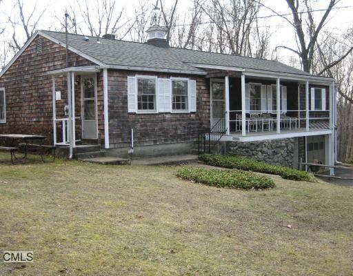 6 Hillcrest Drive Newtown, CT 06470 - Photo 1 of 1 a view of a house with a yard