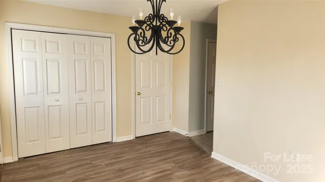 a view of a entryway with wooden floor