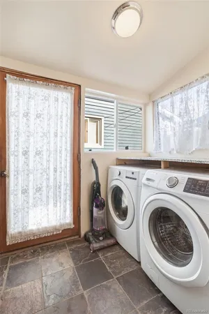 a utility room with dryer and washer