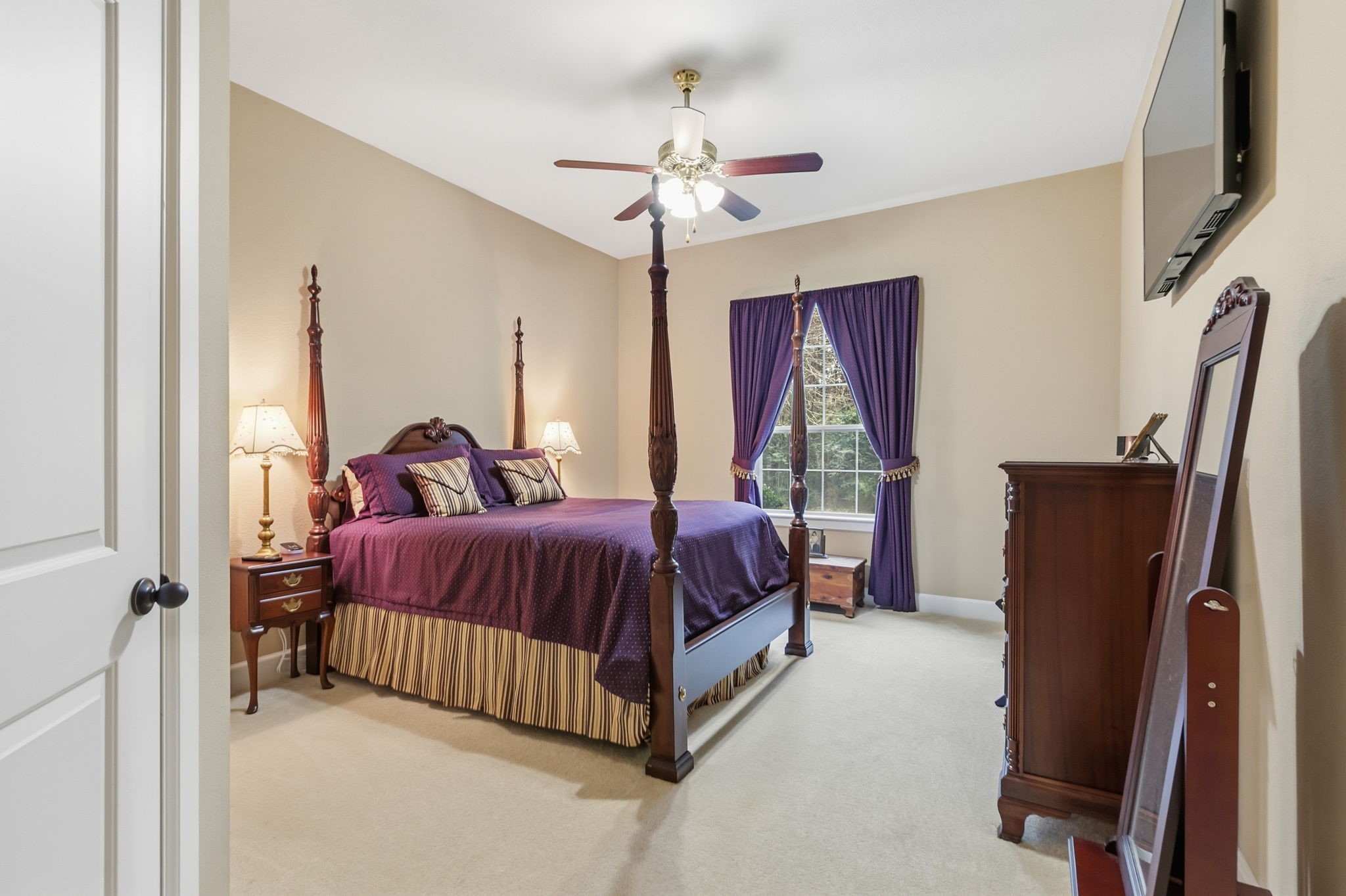 7514 Saddle Blanket Drive Waller, TX 77484 - Photo 27 of 50 One of the secondary bedrooms that features carpet, a ceiling fan, great closet space, and an ensuite bathroom.
