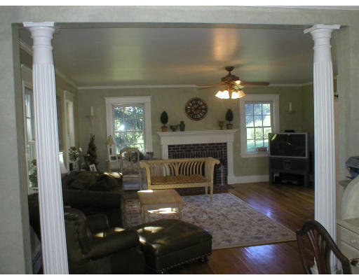 320 Still River Road Harvard, MA 01451 - Photo 5 of 14 a living room with furniture and a fireplace