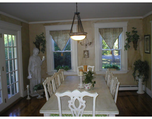 320 Still River Road Harvard, MA 01451 - Photo 7 of 14 a view of a dining room with furniture and wooden floor