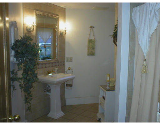 320 Still River Road Harvard, MA 01451 - Photo 9 of 14 a bathroom with a sink and mirror