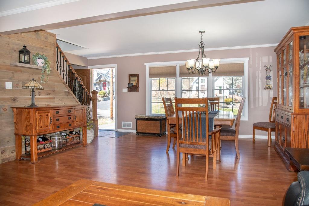 58 May Road Pearl River, NY 10965 - Photo 1 of 1 a view of a dining room with furniture window and wooden floor