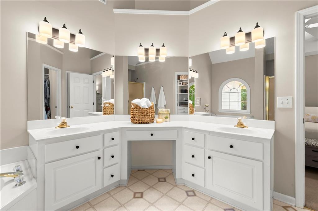 313 Thorntree Lane Canton, GA 30115 - Photo 26 of 51 a spacious bathroom with double sink and a mirror