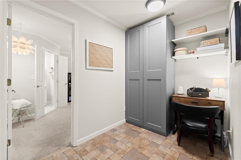 313 Thorntree Lane Canton, GA 30115 - Photo 28 of 51 a room that has a bed and a chair in it