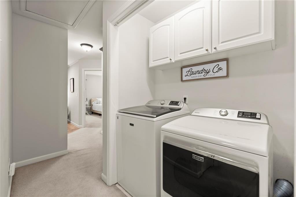 313 Thorntree Lane Canton, GA 30115 - Photo 32 of 51 a utility room with dryer and washer
