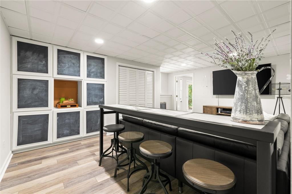 313 Thorntree Lane Canton, GA 30115 - Photo 38 of 51 a kitchen with a sink cabinets and wooden floor