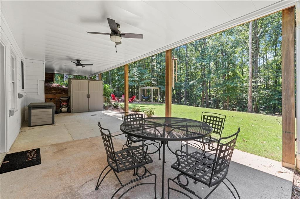 313 Thorntree Lane Canton, GA 30115 - Photo 46 of 51 a view of an outdoor space with furniture and garden