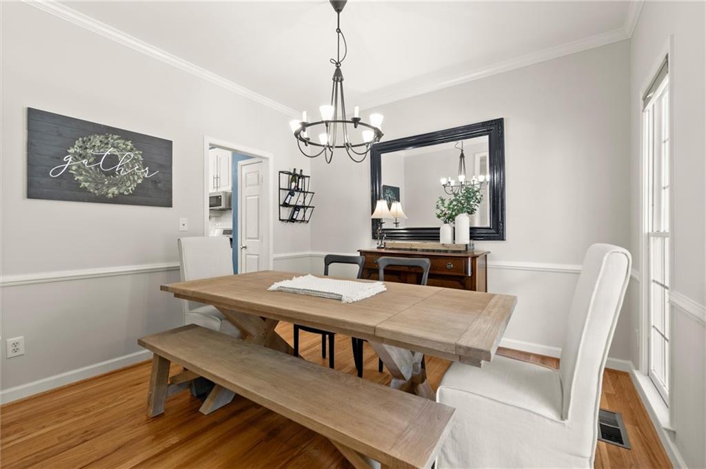313 Thorntree Lane Canton, GA 30115 - Photo 6 of 51 a view of a dining room with furniture window and wooden floor